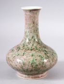 A CHINESE PEACH BLOSSOM GLAZED PORCELAIN BOTTLE VASE, six character mark to base, 16cm high.