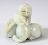 A GOOD CHINESE CARVED JADE FIGURE OF TWO FOO DOGS, 6.5cm high, the base 5.5cm x 6.5cm.