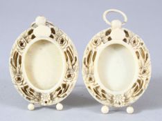 A PAIR OF 19TH CENTURY CHINESE CANTON CARVED IVORY MINIATURE FRAMES - the small frames bnoth with