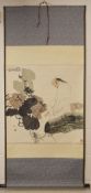 A CHINESE SCROLL PAINTING OF A STYLISED FIGURE amongst flora, image size 66cm x 66cm.
