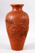 A CHINESE YIXING CLAY MOULDED VASE - The body decorated with raised dragons, 31.5cm