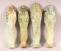 A LOT OF FOUR ANCIENT EGYPTIAN POTTERY USHABTI FIGURES - Each with a turquoise glaze and Egyptian