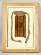 AN EARLY PERUVIAN CHANCAY TEXTILE FRAGMENT, framed and glazed, fragment approx. 29cm x 13cm.