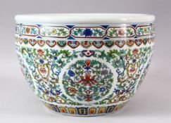 A FINE CHINESE DOUCAI DECORATED PORCELAIN FISH BOWL / PLANTER - the body of the planter well
