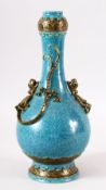 A CHINESE SPECKLED TURQUOISE GROUND BOTTLE VASE, with moulded chilong to the body and gilded