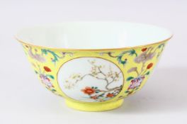 A GOOD CHINESE FAMILLE JAUNE PORCELAIN BOWL, the exterior decorated with four roundels containing