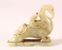 A CHINESE CARVED JADE FIGURE OF A BIRD, 7.5cm.