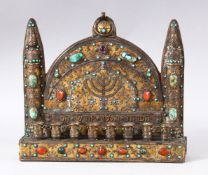 A GOOD JEWISH JUDIACA GILT METAL AND WOOD MENORAH / HANUKKAH, inset with semi precious hardstones,