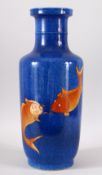 A GOOD CHINESE PORCELAIN VASE, with rich blue speckled ground and painted with four carp in iron