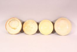 FOUR CHINESE TERRACOTTA BOWLS, varying sizes.
