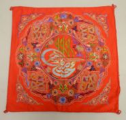 AN OTTOMAN EMBROIDERED CUSHION COVER - embroidered depicting a central roundel of calligraphy -