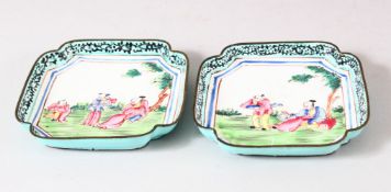 A PAIR OF CHINESE CANTON ENAMELLED DISHES, painted with figures in a landscape, 9.5cm square.