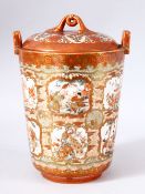 AN UNUSUAL JAPANESE KUTANI JAR AND COVER, painted with many panels depicting figures, animals and