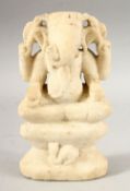 A 17TH/18TH CENTURY SOUTH INDIAN CARVED MARBLE FIGURE OF GANESH, 18cm high.