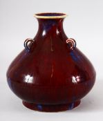 A GOOD CHINESE FLAMBE GLAZE SQUAT SHAPE VASE, with three rings beneath the neck, six character