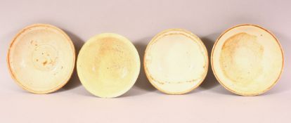 FOUR CHINESE TERRACOTTA BOWLS, varying sizes.