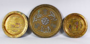 THREE SILVER & COPPER INLAID CAIROWARE BRASS DISHES - each with inlaid calligraphy , two with