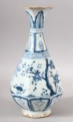 A CHINESE MING STYLE BLUE & WHITE PORCELAIN OCTAGONAL VASE - decorated with various native trees,