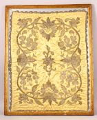 A CHINESE EMBROIDERED FRAMED TEXTILE - upon a mustard yellow ground with embroidered floral display,