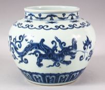 A CHINESE MING STYLE BLUE & WHITE PORCELAIN JAR - decorated with chilong and foliage - six character