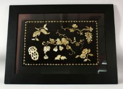 A CHINESE DECORATIVE LACQUER PANEL INLAID WITH MOTHER OF PEARL, depicting various fruits and