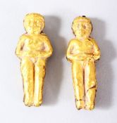 TWO GOLD OR GILT METAL FIGURAL PENDANTS, both approx 4cm (untested).