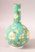 A GOOD DECORATIVE CHINESE TURQUOISE GROUND ENAMEL VASE, with flowers and foliate design, 22.5cm
