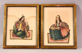 TWO INDIAN MINIATURE PAINTINGS, each with a seated female, framed and glazed, both 23cm x 18cm.
