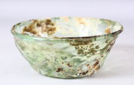 AN ISLAMIC GLASS BOWL, 16.5cm diameter.