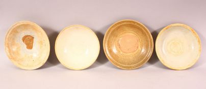 FOUR CHINESE TERRACOTTA BOWLS, varying sizes.