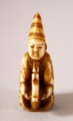 A JAPANESE MEIJI PERIOD CARVED IVORY NETSUKE - BOY & HOBBY HORSE - the boy depicted riding upon
