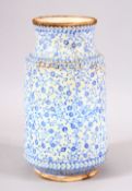 A GOOD IZNIK BLUE & WHIITE POTTERY ALBERELLO - decorated with scrolling blue foliage - 21cm
