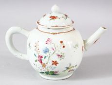 A CHINESE QIANLONG FAMILLE ROSE PORCELAIN TEA POT & COVER - decorated with native floral displays,
