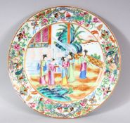 A 19TH CENTURY CHINESE CANTON FAMILLE ROSE PORCELAIN PLATE - the plate with a central panel