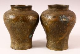 A RARE PAIR OF 18TH CENTURY DAMASCUS SILVER INLAID BRASS VASES - each with floral motif decoration