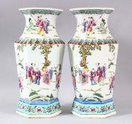A PAIR OF CHINESE FAMILLE ROSE PORCELAIN HEXAGONAL PORCELAIN VASES - each vase of hexagonal form,