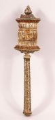 A 19TH CENTURY TIBETAN CARVED BONE AND WHITE METAL PRAYER WHEEL - with carved bone core with