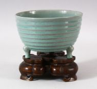 A GOOD CHINESE CELADON TRIPOD CENSER & BRONZE STAND - the censer with tripod feet and a natural