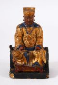 A GOOD 18TH / 19TH CENTURY CHINESE CARVED WOOD & LACQUERED SEATED FIGURE - the figure seated in