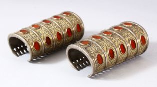 A PAIR OF ISLAMIC LONG WRIST BANGLES / ARM GUARDS, 13.5cm long.