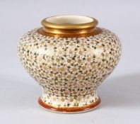 A JAPANESE MEIJI PERIOD SATSUMA SQUAT FORMED VASE - The small vase with millefluer style floral