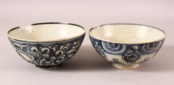 TWO EARLY CHINESE BLUE AND WHITE SHIPWRECK PORCELAIN BOWLS, (af), 14.5cm diameter.