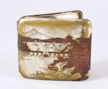 A JAPANESE MEIJI PERIOD SILVER & MIXED METAL CIGARETTE CASE - The exterior with native landscape