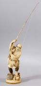 A LARGE JAPANESE MEIJI PERIOD CARVED IVORY OKIMONO - FISHERMAN - the man stood holding his rod aloft