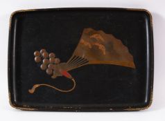 A JAPANESE MEIJI PERIOD LACQUER TRAY - decorated with a landscape view fan and tassel- 34cm x 24cm