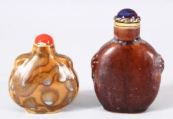 TWO CHINESE PORCELAIN SNUFF BOTTLES - one jun ware twin handle snuff bottle, the other of graduating