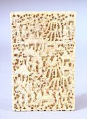 A GOOD CHINESE CANTON CARVED IVORY CARD CASE, carved with figures in a busy landscape, 10.5cm x 6.
