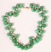 A CHINESE JADEITE AND SEED PEARL NECKLACE, each stone approx. 15mm.