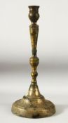 A LARGE 17TH/18TH CENTURY OTTOMAN BRONZE CANDLESTICK, 49cm high.