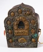A CHINESE TIBET METAL EMBOSSED INCENSE BURNER - the back opening - the front with a glass insert for